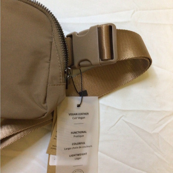 Tan Crossbody Bag with Adjustable Strap and Durable Fabric - Picture 9 of 9